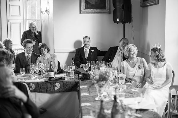 guests laughing at speeches