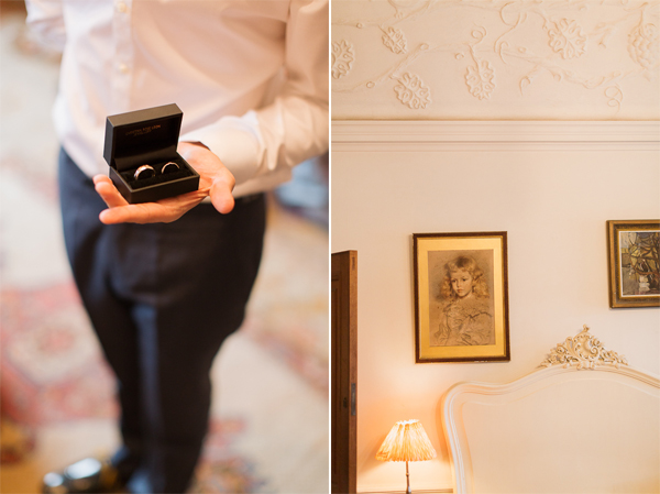 groom holding wedding rings at bedroom in castle in scotland