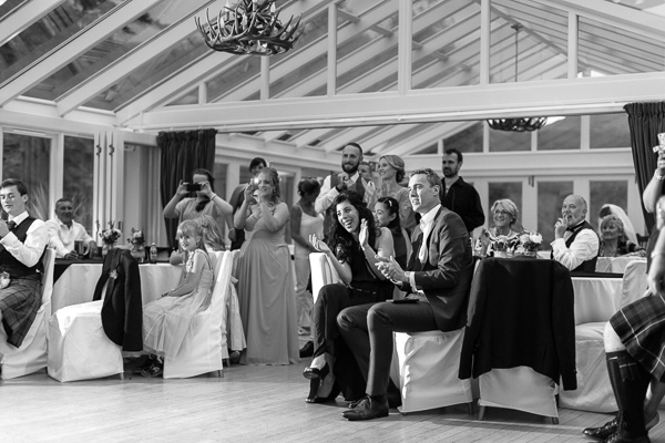 guests claping during first dance