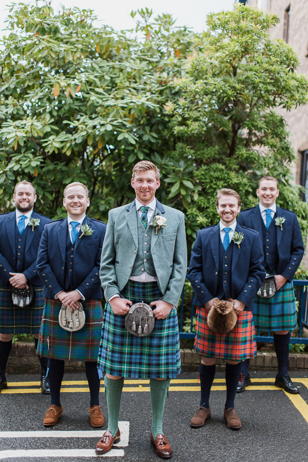 groom with ushers outside of the bearsden church glasgow