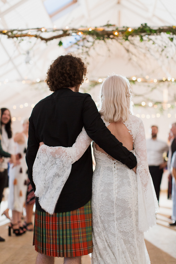 bride and groom embraced during dnacing at crear weddings