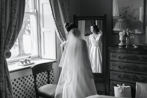 bride looking through the window 