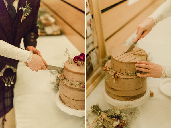 bride and groom cutting teh cake