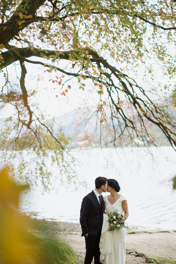 wedding photographers glasgow bride and groom kissing