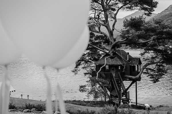tree house at the lodge on loch goil in scotland with baloons