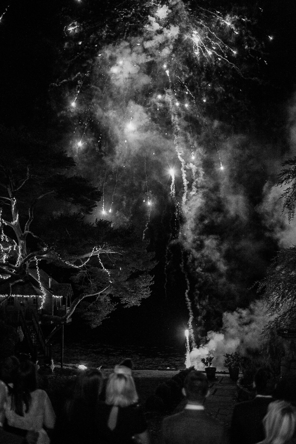 fireworks next to tree house at the lodge on loch goil in scotland