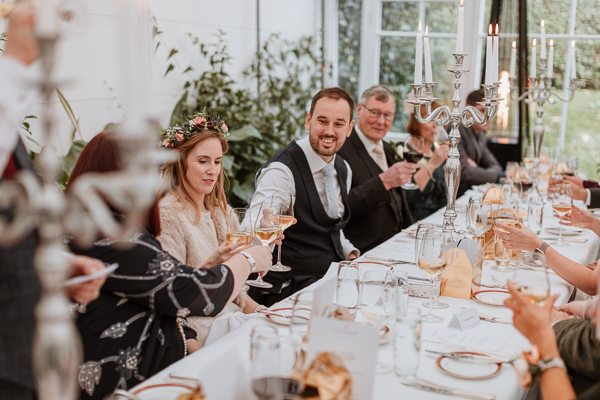newlyweds raising toast wedding photographers ayshire