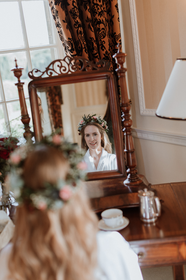 Bride in the mirror at Glenapp Castle Scotland