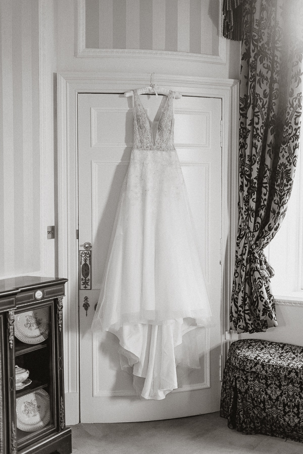 Wedding dress hang in a Glenapp Castle suite Scotland 