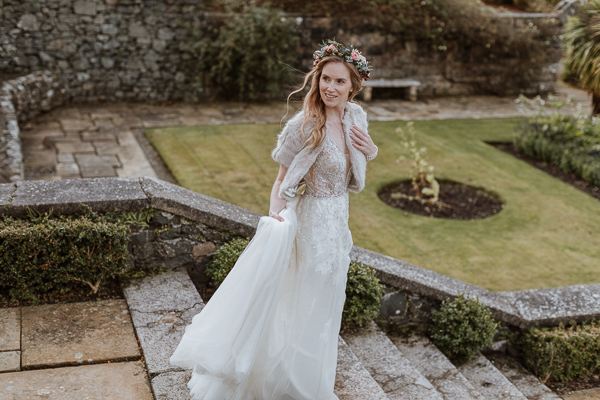 bride walkign down the steps at wedding photoshoot at Glenapp estate